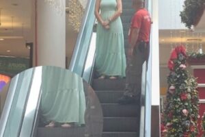 Vestido fica enroscado em escada rolante