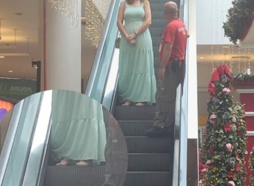 Vestido fica enroscado em escada rolante