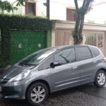 Estacionar em frente a própria garagem