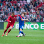 Cristiano Ronaldo (L), Luka Modric (R)